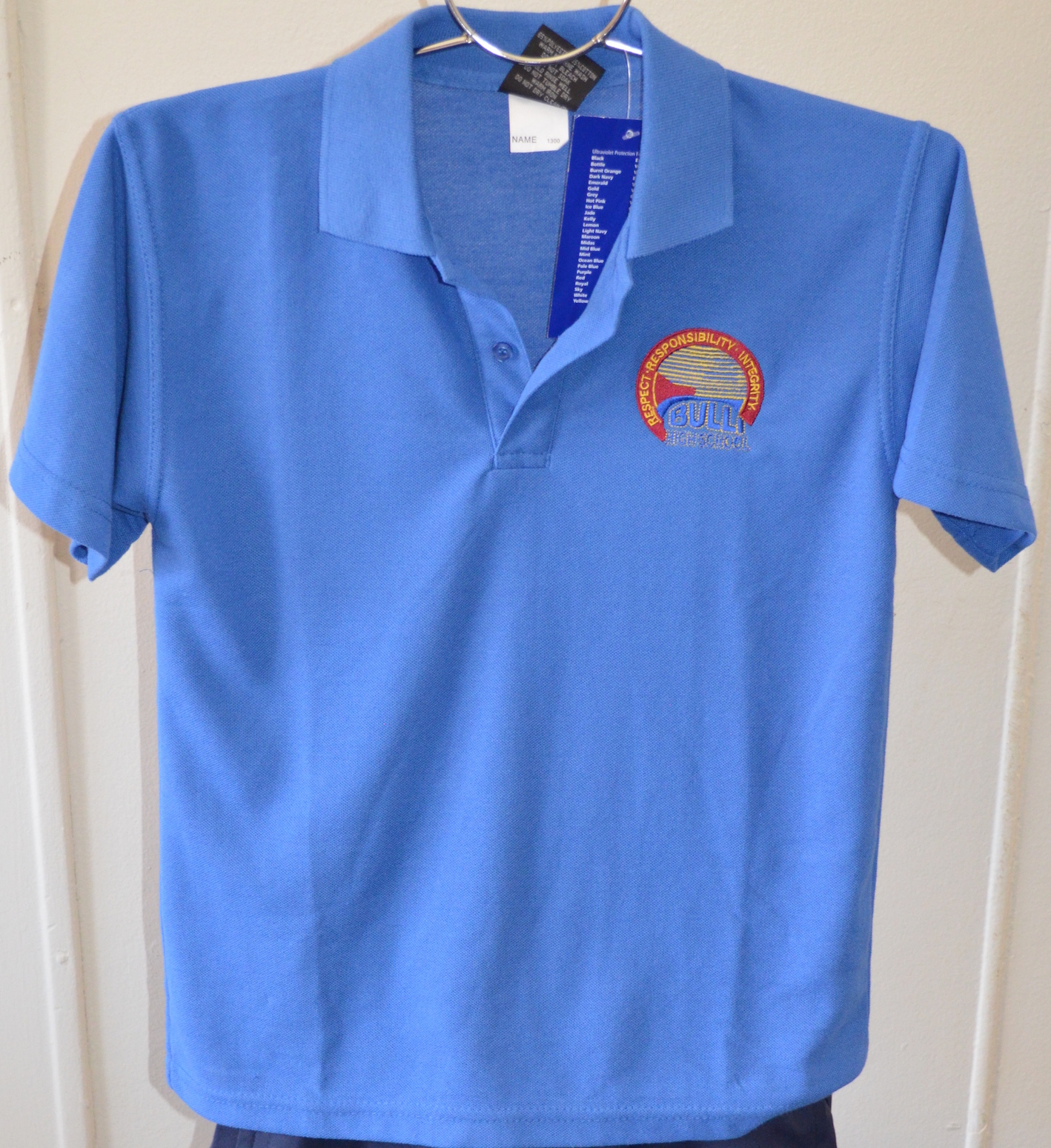 Junior blue polo shirt (unisex)